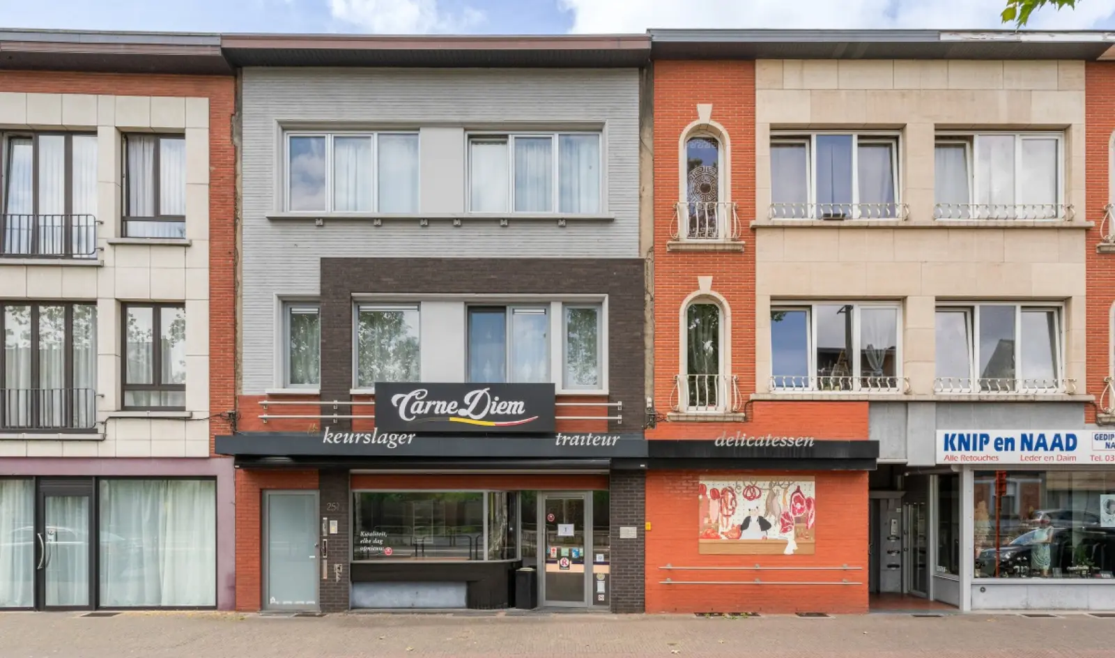 Opbrengsteigendom met 2 appartementen en handelsgelijkvloers